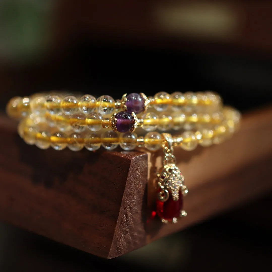 Brazilian rutilated quartz bracelet with three-circle gold chain and Chinese-style design