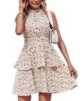 Women's backless halter neck A-line summer dress with ruffle details in a boho style.