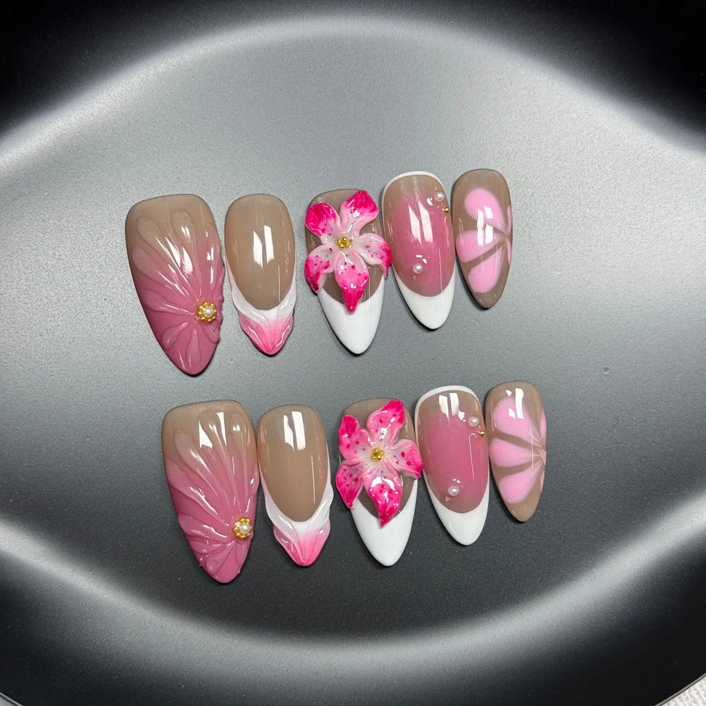 French style artificial nails with 3D lily and ice flower design on almond-shaped plastic tips.
