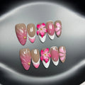 French style artificial nails with 3D lily and ice flower design on almond-shaped plastic tips.