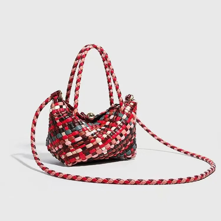 Women's casual handmade woven PU shoulder bag in colour, 18x11x14cm, on display