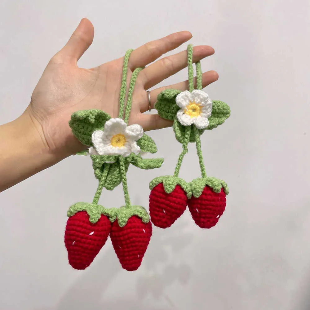 Handmade strawberry-shaped car pendant knitted from cotton and hemp fibres