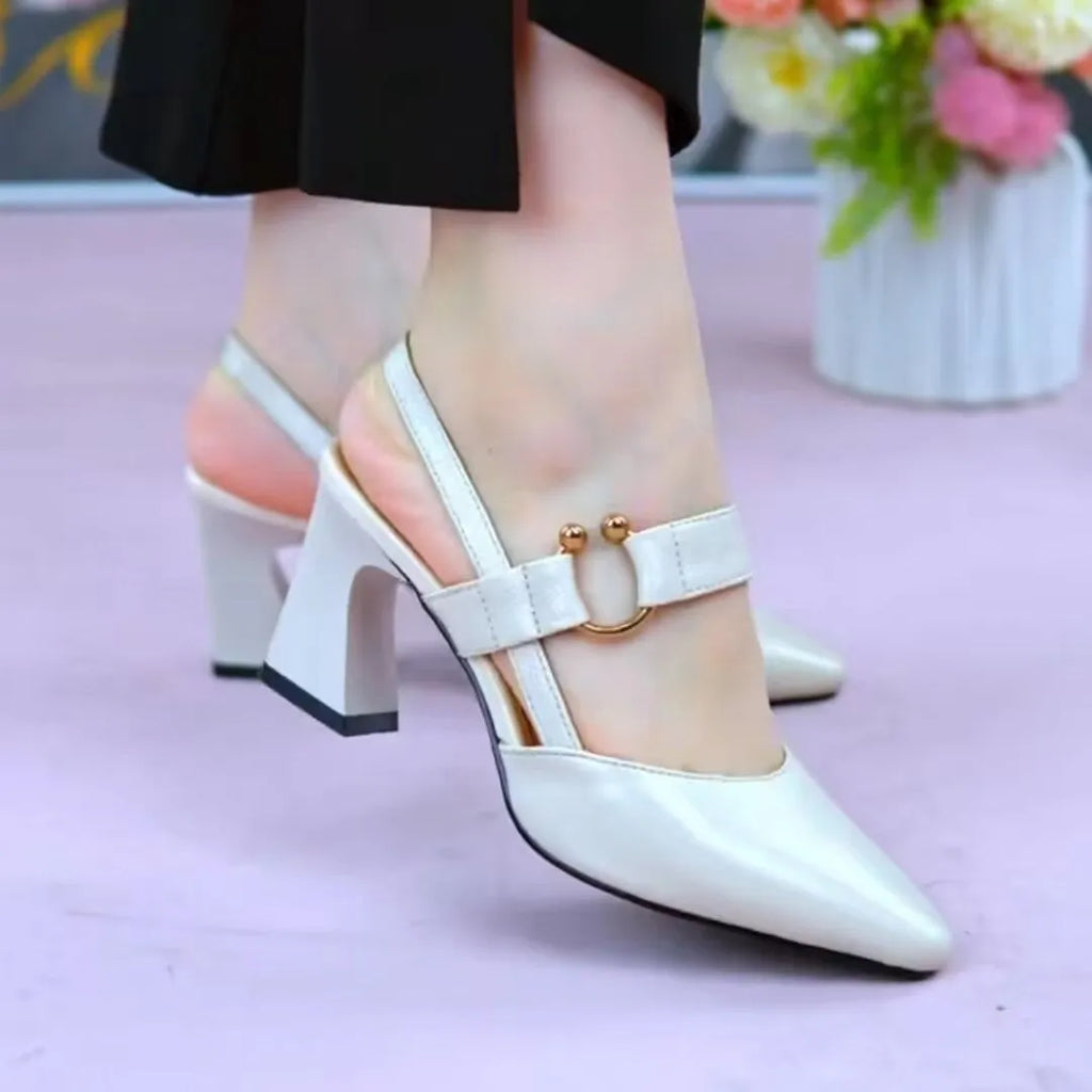 Women's apricot leather sandals with a closed toe, chunky block heel, and an ankle strap.