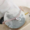 Pet collar with rhinestone heart design in gold, platinum, and rose gold colours on adjustable chain