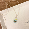Women's joker character pendant necklace with a cotton and linen clavicle chain.