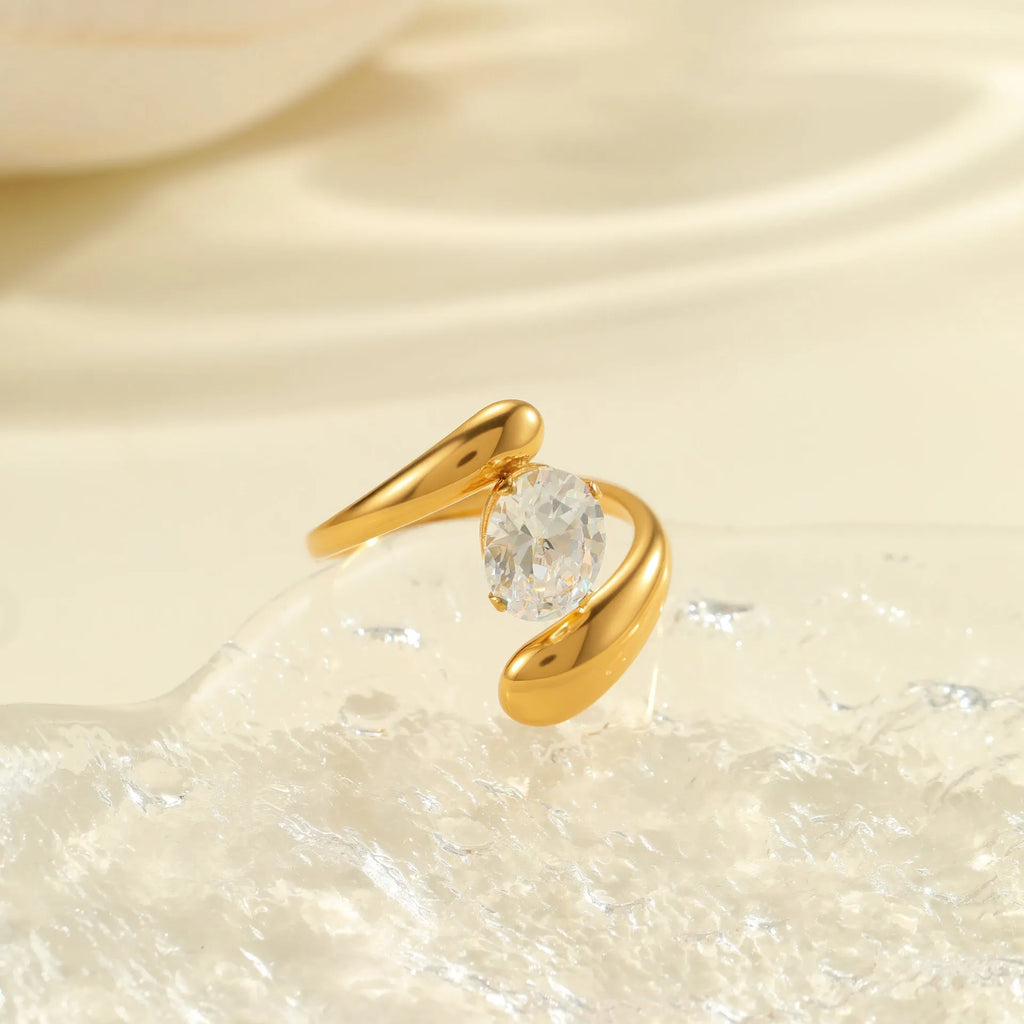Adjustable geometric zircon ring in stainless steel with electroplated finish showing open-mouth design