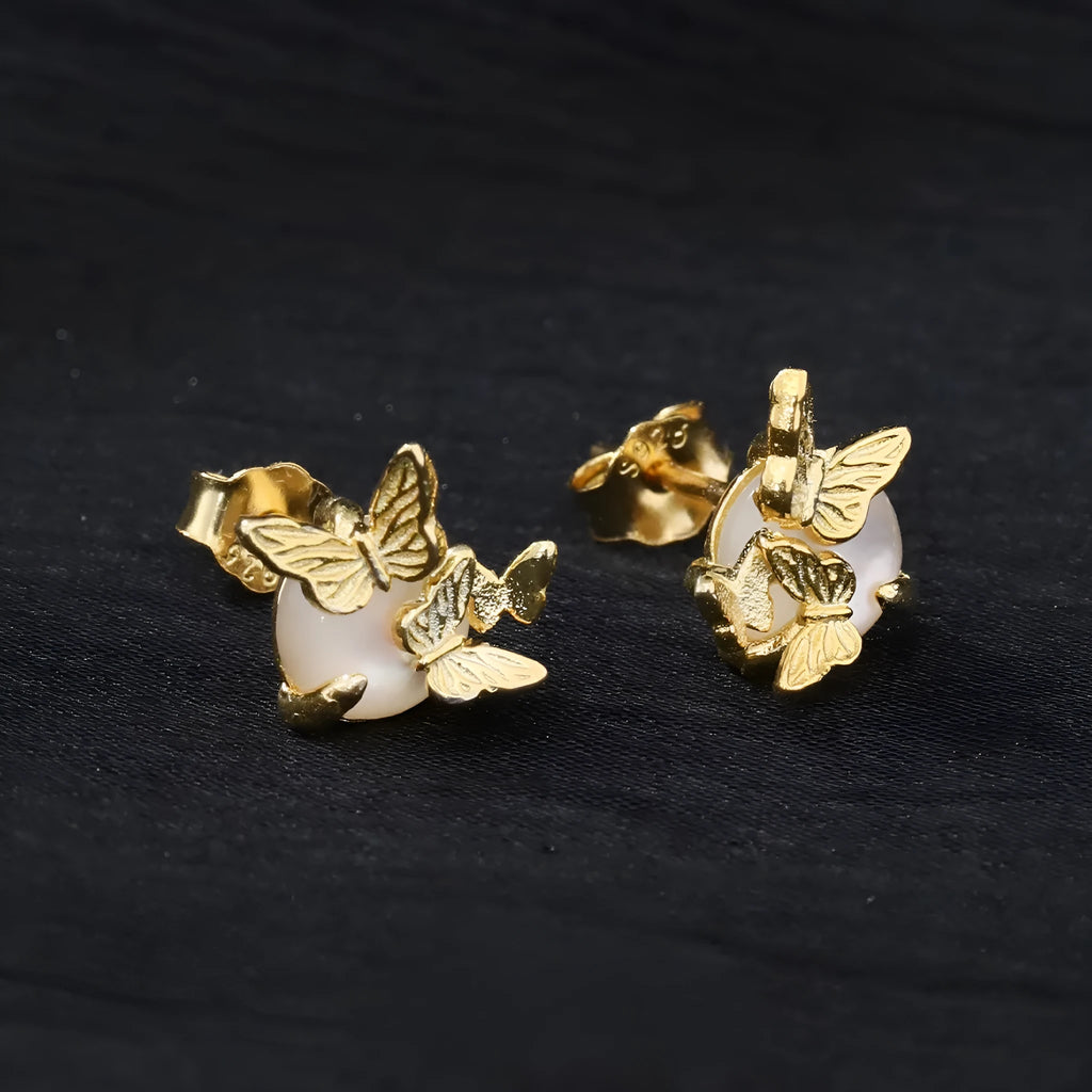 Butterfly ear studs in gold or white gold finish on 925 silver with animal zodiac design