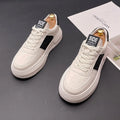 Unisex white casual sports shoes with green accents featuring cloth upper and rubber foam sole