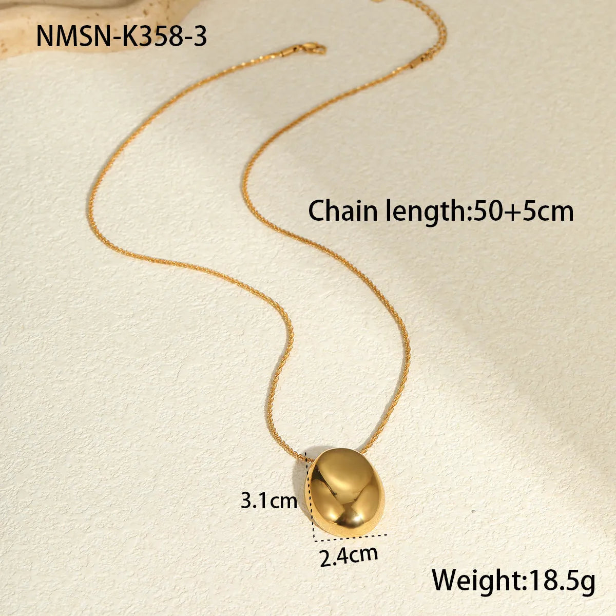 18K gold-plated geometric pendant on an adjustable stainless steel necklace chain.