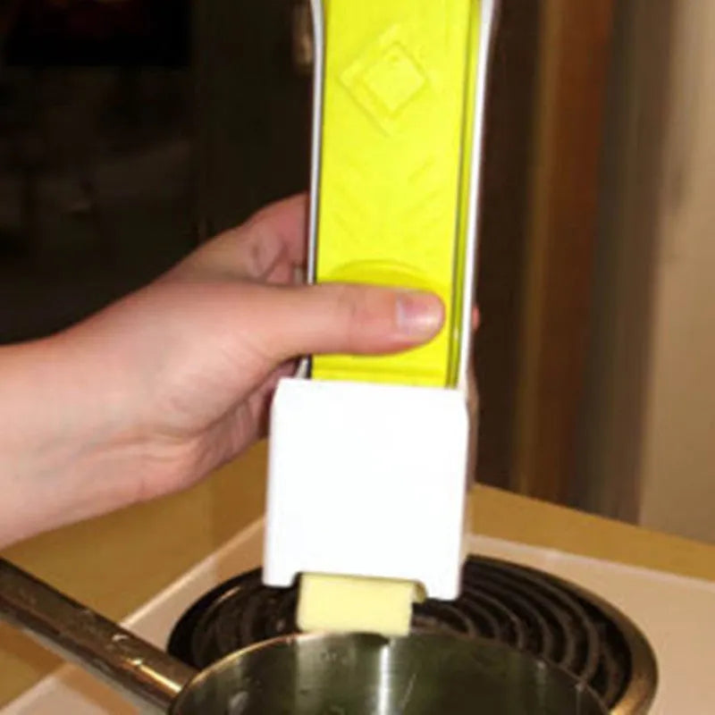 Yellow stick butter cutter cheese slicer one-button dispenser with ABS body and stainless blades on white background