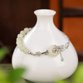 Hetian jade peace buckle bracelet in gold-plated 925 silver with lotus pattern for women
