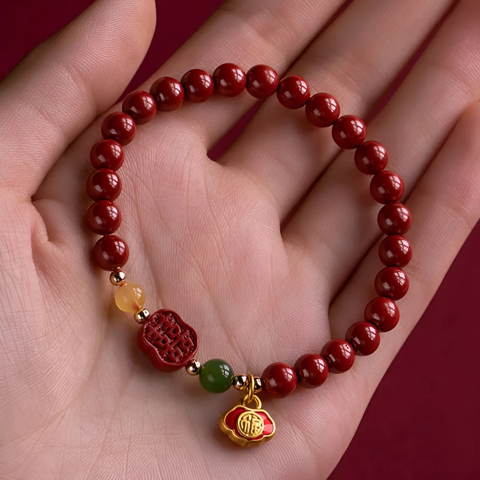 Happy Eyebrow Bracelet with fu character charm in cinnabar emperor sandstone beads.