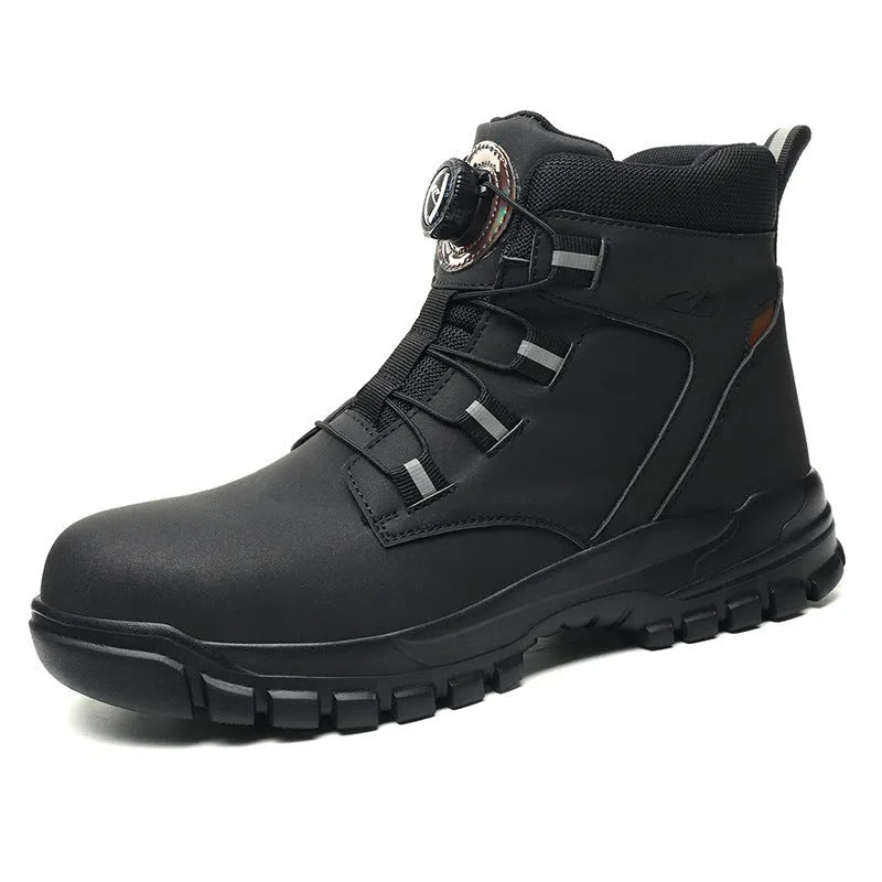 Pair of lightweight black leather labour protection safety shoes with rubber soles on a grey background.