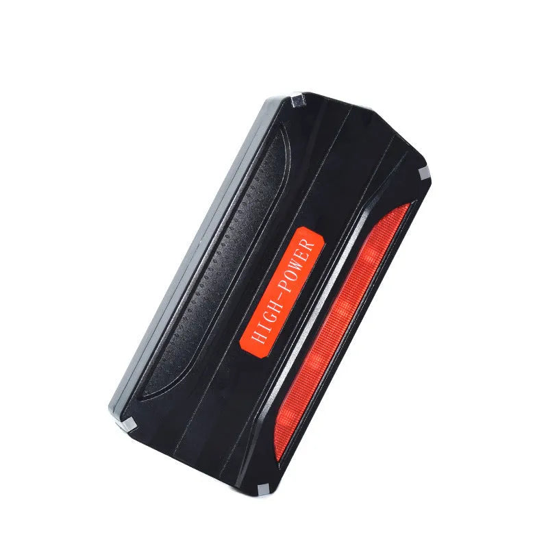 Black and red 12V vehicle emergency jump starter with 7800mAh battery capacity.