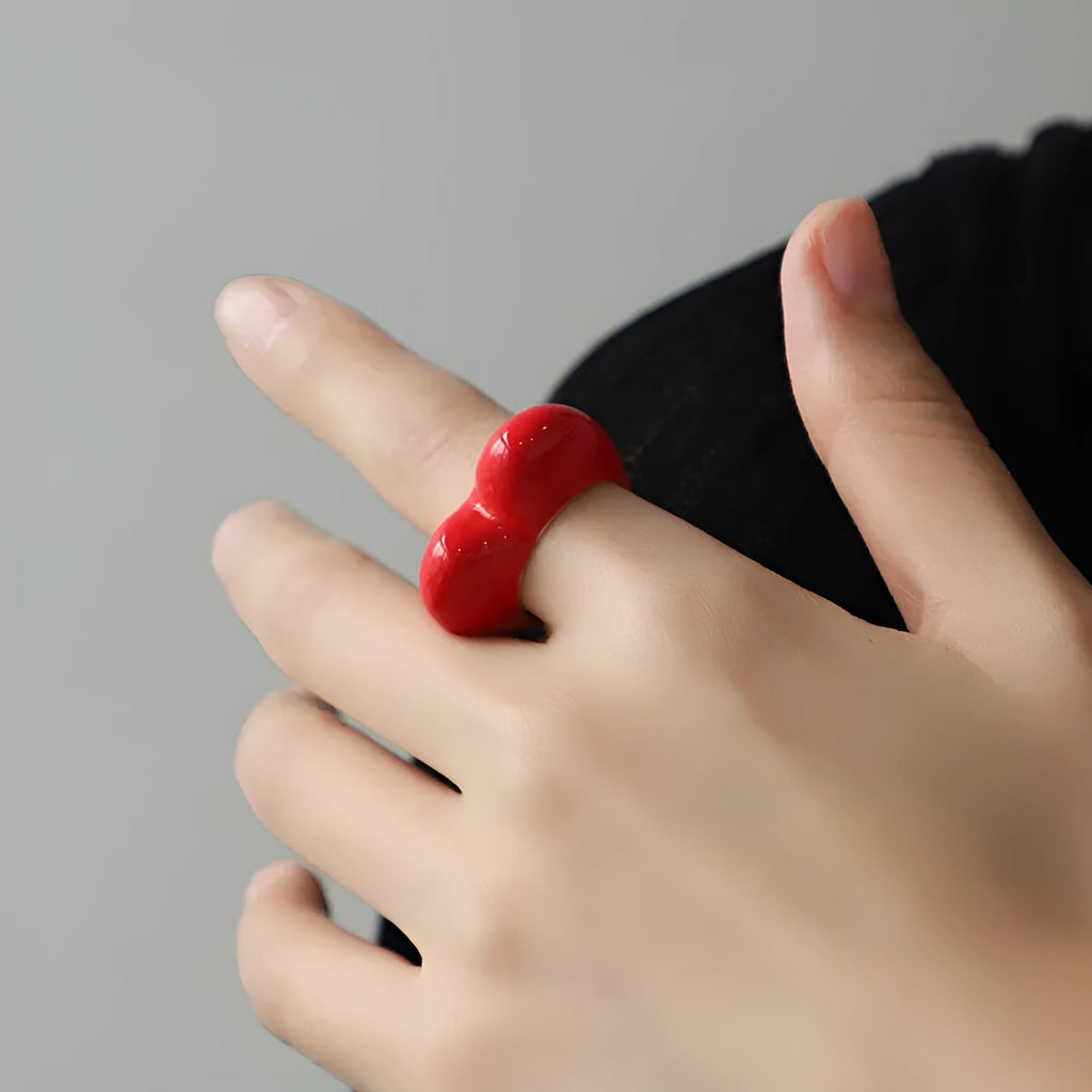 Original design heart-shaped enamel ring in zinc alloy showing three-dimensional detail.