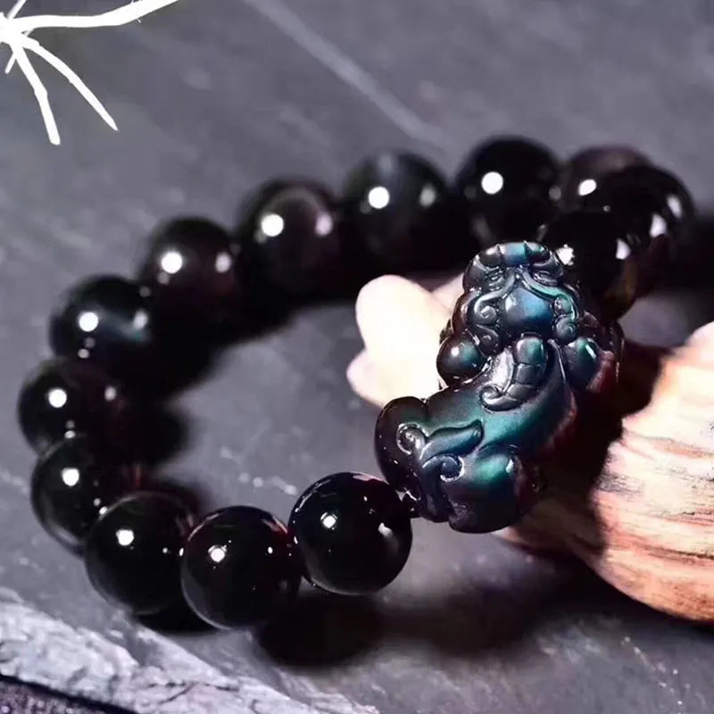Natural ice colour eye obsidian crystal bracelet showing bead texture and sizing options