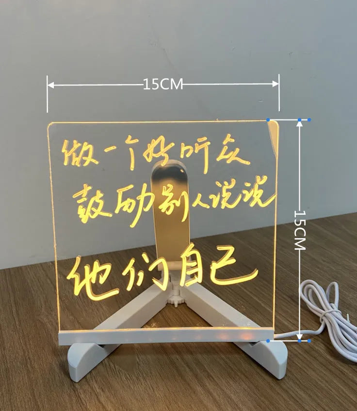 Acrylic DIY note board LED night light with pens on desk, showing written message and soft glow