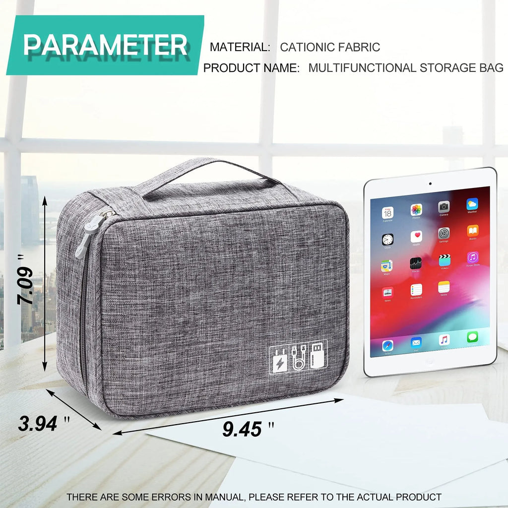 Black electronics organiser case open to show mesh pockets, elastic loops and removable padded dividers inside.