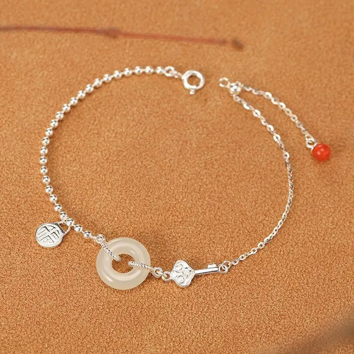 Silver Hetian jade bracelet with blessing card and peace buckle design in geometric Chinese style