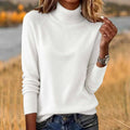 Long sleeve solid colour pullover sweater for women in loose fit, available in multiple colours including grey, black, white, and red