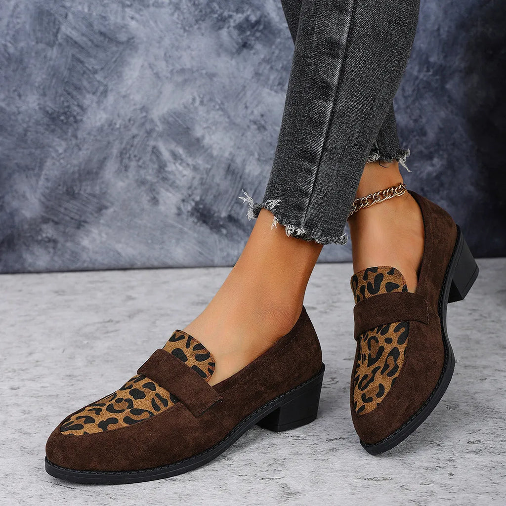 Women's brown leopard print suede slip-on shoes with chunky mid-heel and pointed toe on a white background.