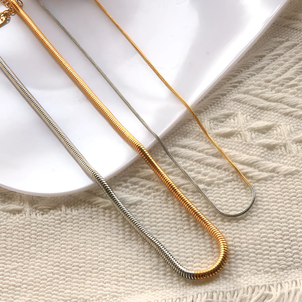 Golden stainless steel snake bones chain necklace with 3mm thickness and geometric lines design
