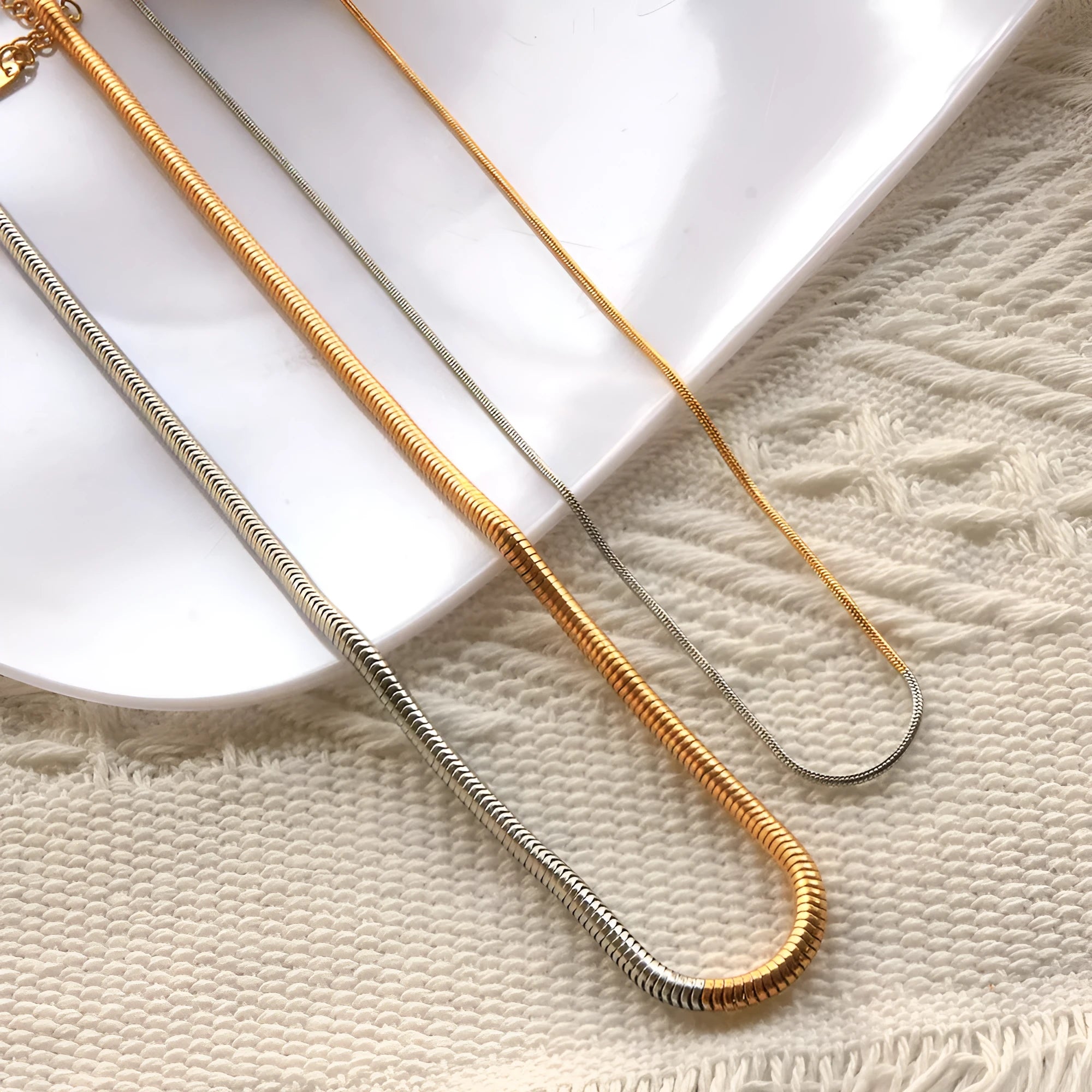 Golden stainless steel snake bones chain necklace with 3mm thickness and geometric lines design