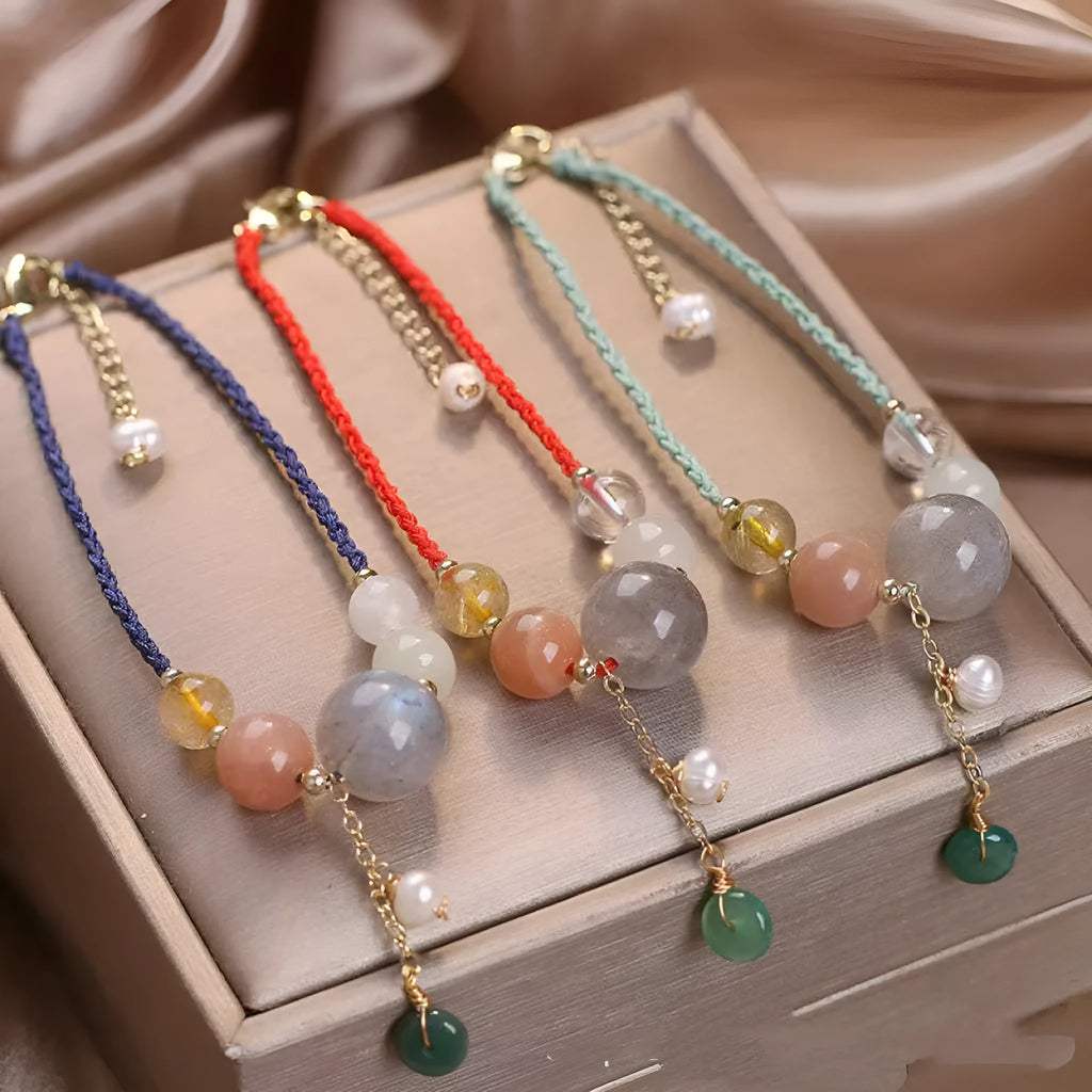 Hand-woven crystal peace buckle bracelet for women with sequins in red, green, and blue colours