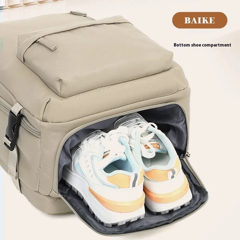 Women's large capacity grey waterproof Oxford cloth travel backpack with curved shoulder straps