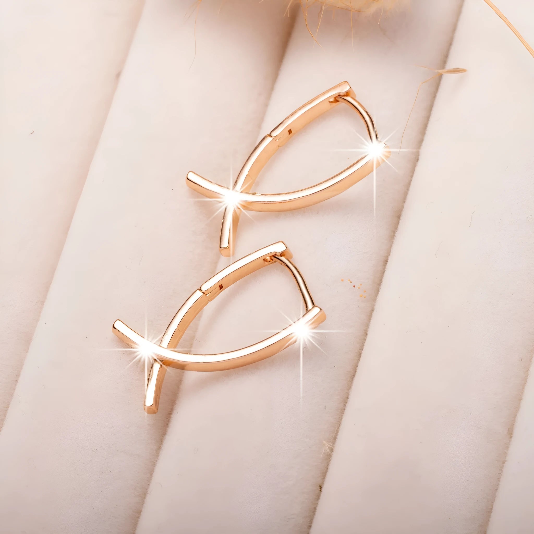 Rose gold copper cross shaped earrings with geometric design for pierced ears
