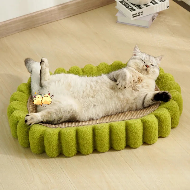 Green oval cat scratch pad bowl measuring 650mm serving as scratching board and cat bed