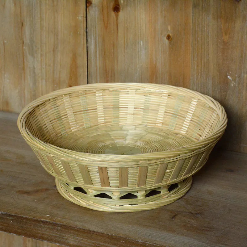 Handmade bamboo storage basket with woven construction in three size options