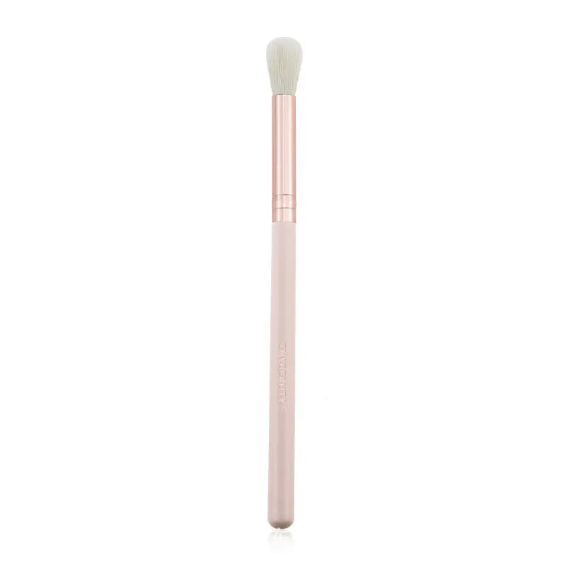 26 pink makeup brushes with wooden handles displayed in a open pink PU travel case