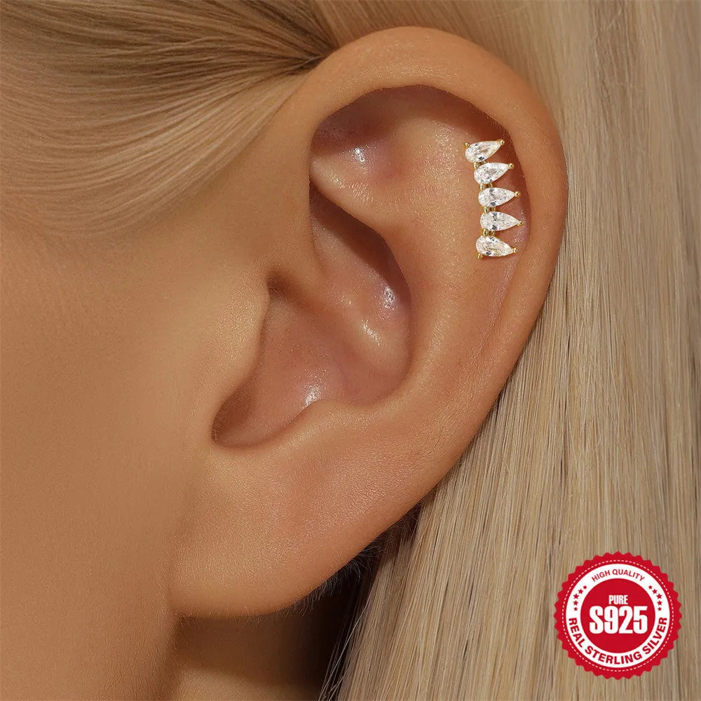 S925 sterling silver geometric earrings with moon and diamond-embedded star design in a gold colour.