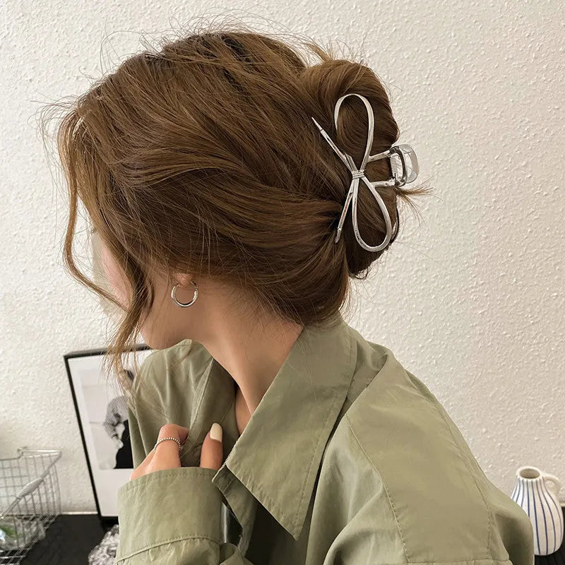 Alloy bow barrette for women Korean style hair grip in silver finish with manual polish