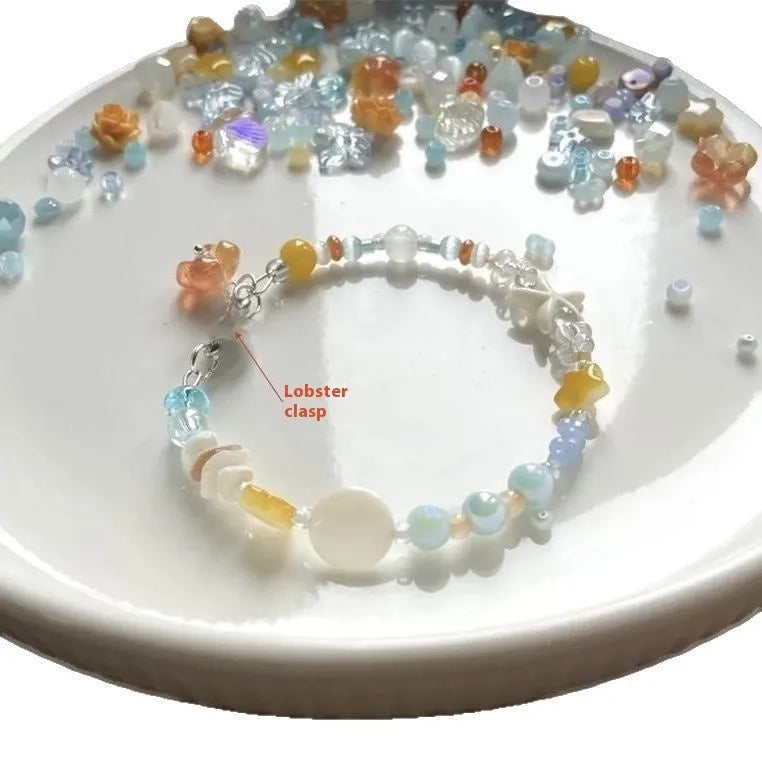 Orange alloy bracelet with diamond shape and round decorative elements for women's summer fashion