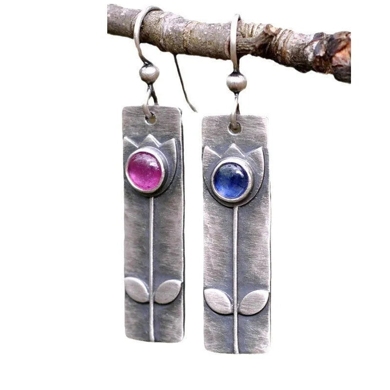Antique finish red sapphire geometric earrings with ellipse shapes and electroplated metal construction