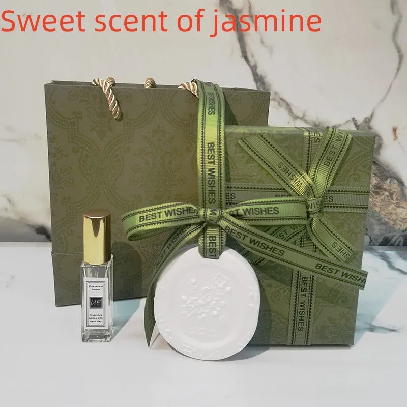 Car aromatherapy stone pendant hanging from rearview mirror with gardenia fragrance option