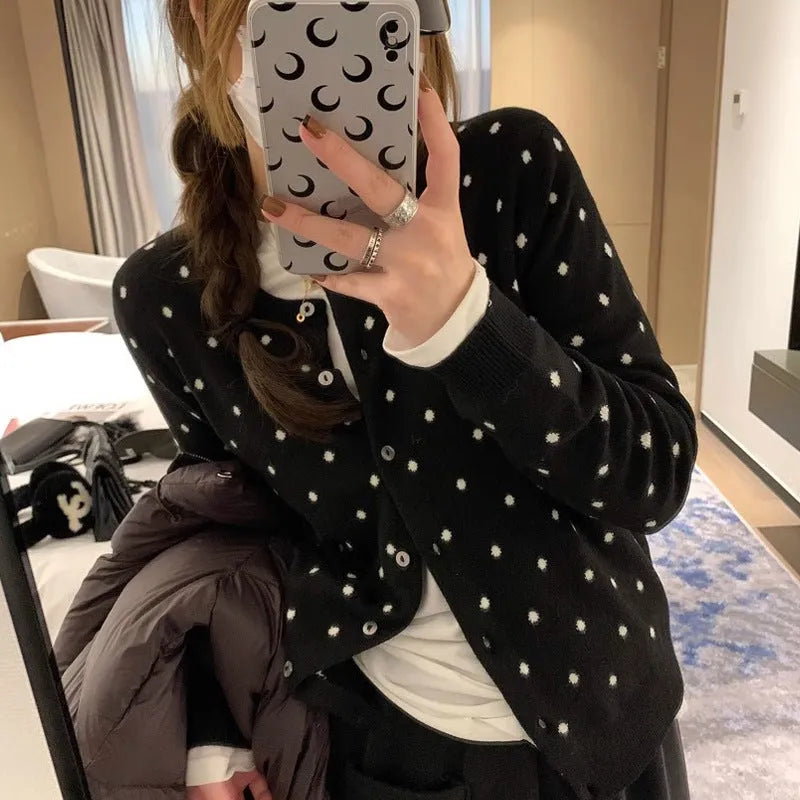 Women's grey knitted cardigan with crochet flower details, loose fit, long sleeves