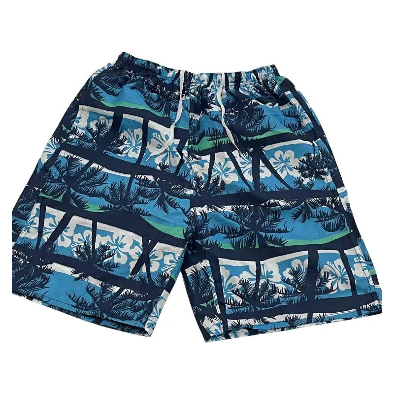 Men's floral print swimming trunks in polyester fabric with five-point casual design
