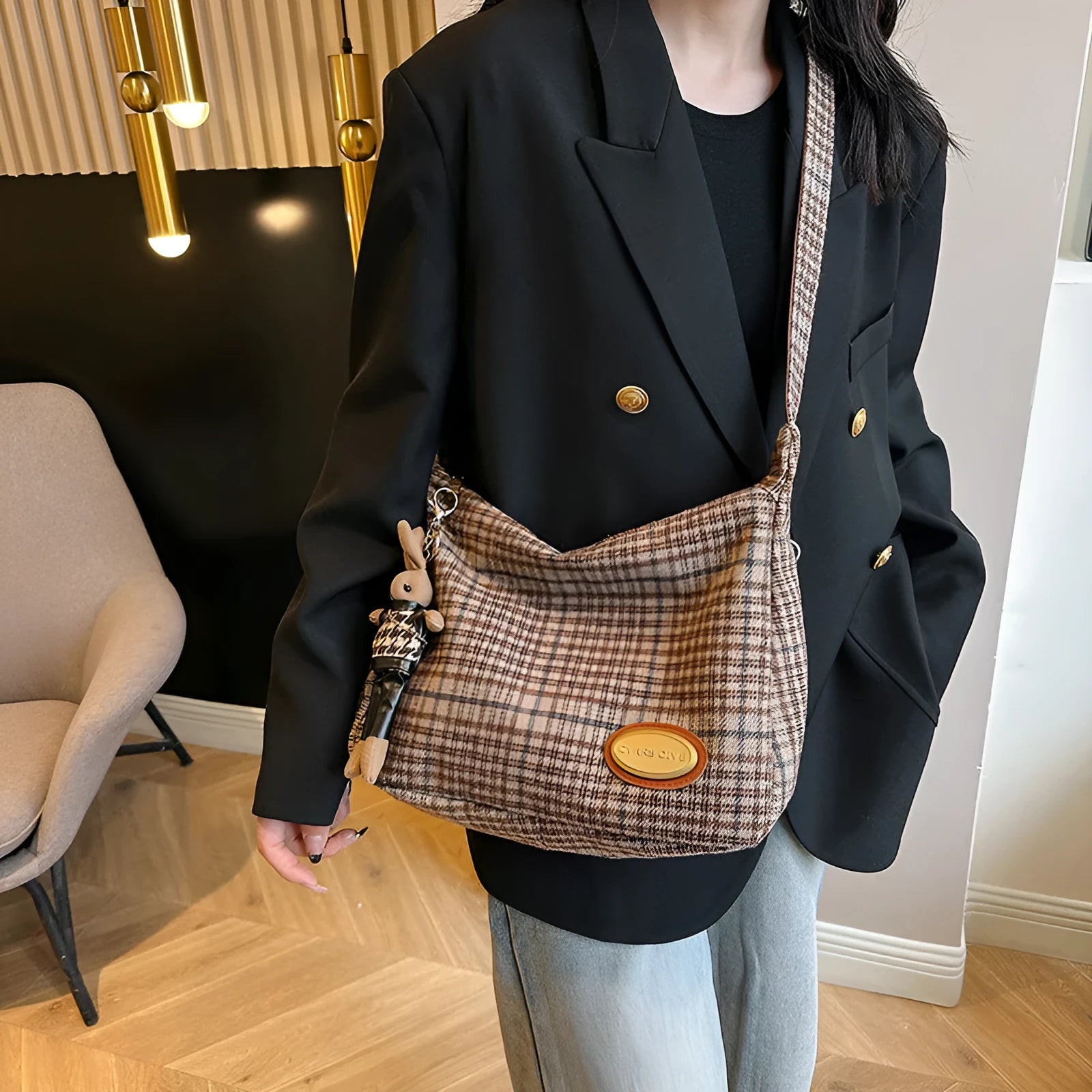 Large capacity soft woolen shoulder bag for women in khaki with pendant, horizontal square shape with sewing line detail.