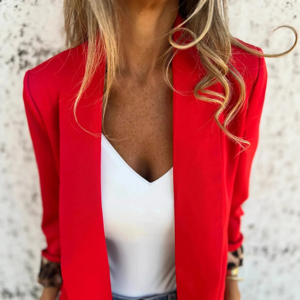 Animal print slim fit suit jacket with cheetah pattern in black or red, polyester construction