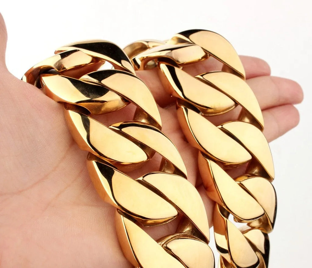 Men's gold titanium steel vacuum plating casting necklace with geometric whip chain design on white background