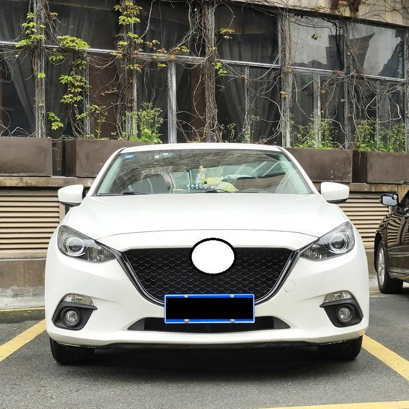 Audi A1 8X front splitter retrofit kit with three-section design in black Unksera pattern.