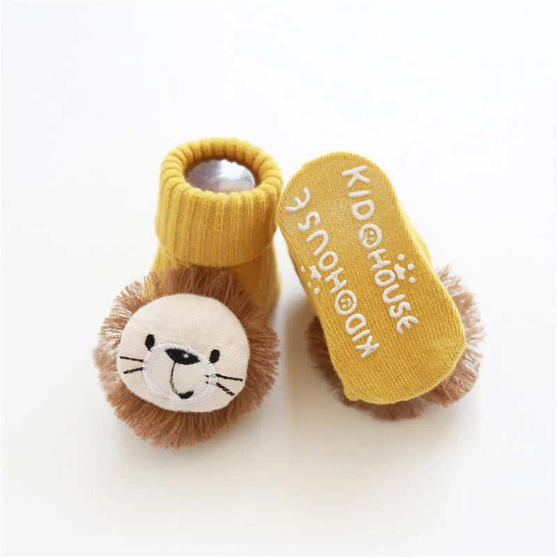 Cotton baby floor socks in multiple patterns including blue bow and lion designs