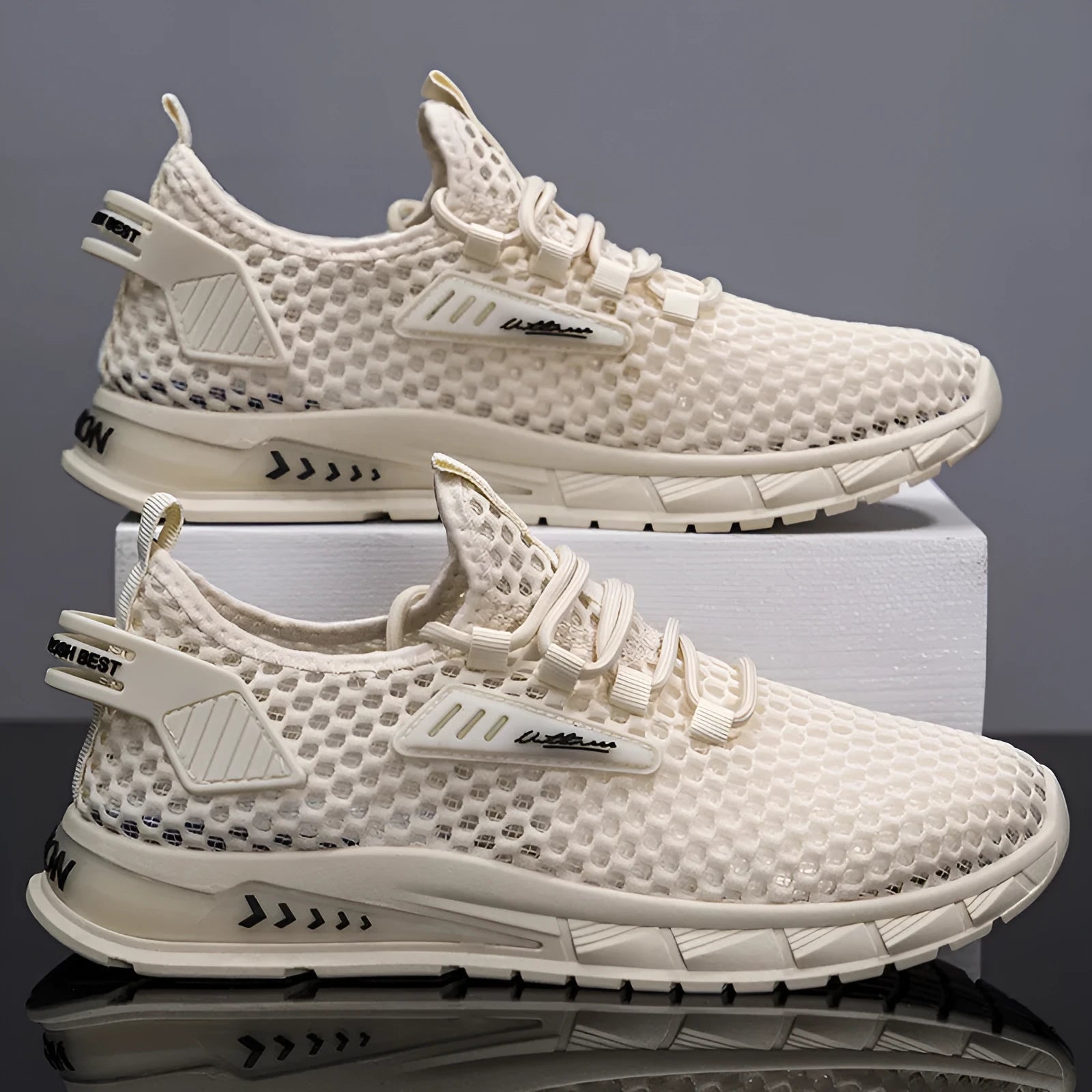 Men's beige casual sneakers with synthetic leather upper, mesh lining, and flat EVA sole on a white background