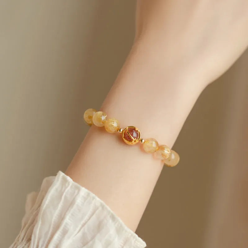 Natural gold rutilated quartz crystal bracelet with diamond cut beads, 6mm and 8mm sizes, unisex design