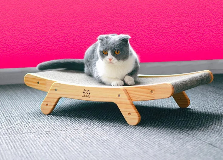 Corrugated cat scratch board with solid wood frame, 55cm by 32.5cm by 13cm, on a wooden floor