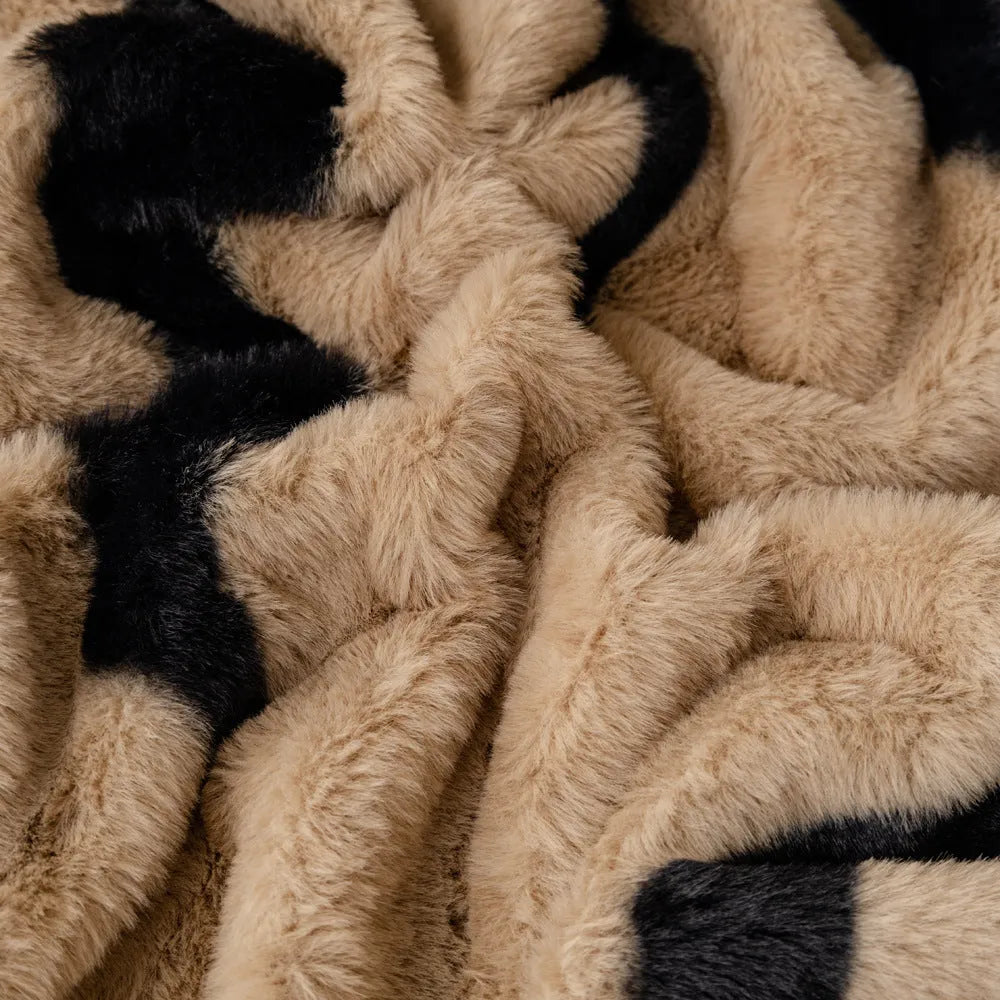 Zebra pattern flannel sofa cover in light luxury style draped over a sofa