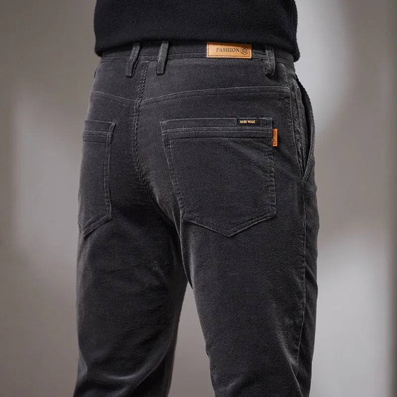 Slim fit straight corduroy trousers in black cotton fabric with mid waist, available in multiple sizes